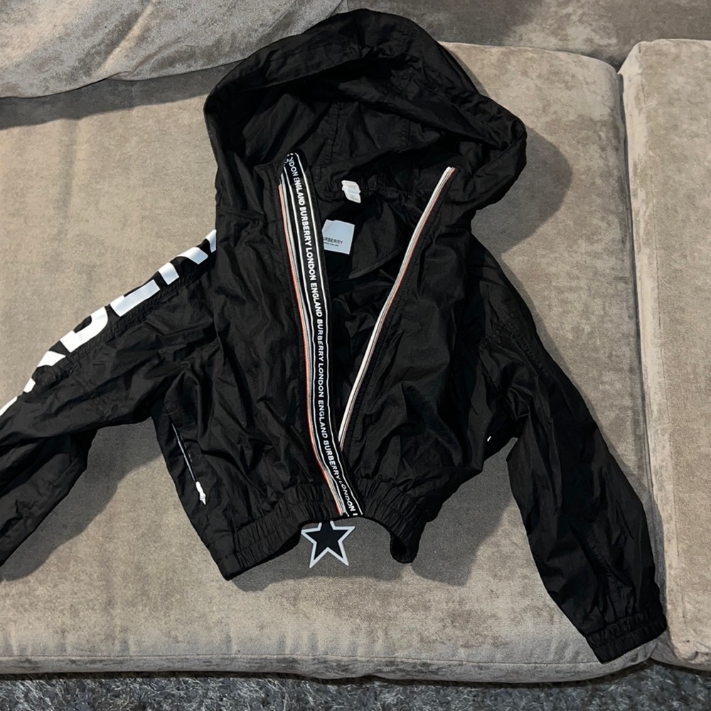 Black unisex kids Burberry light weight jacket slightly worn